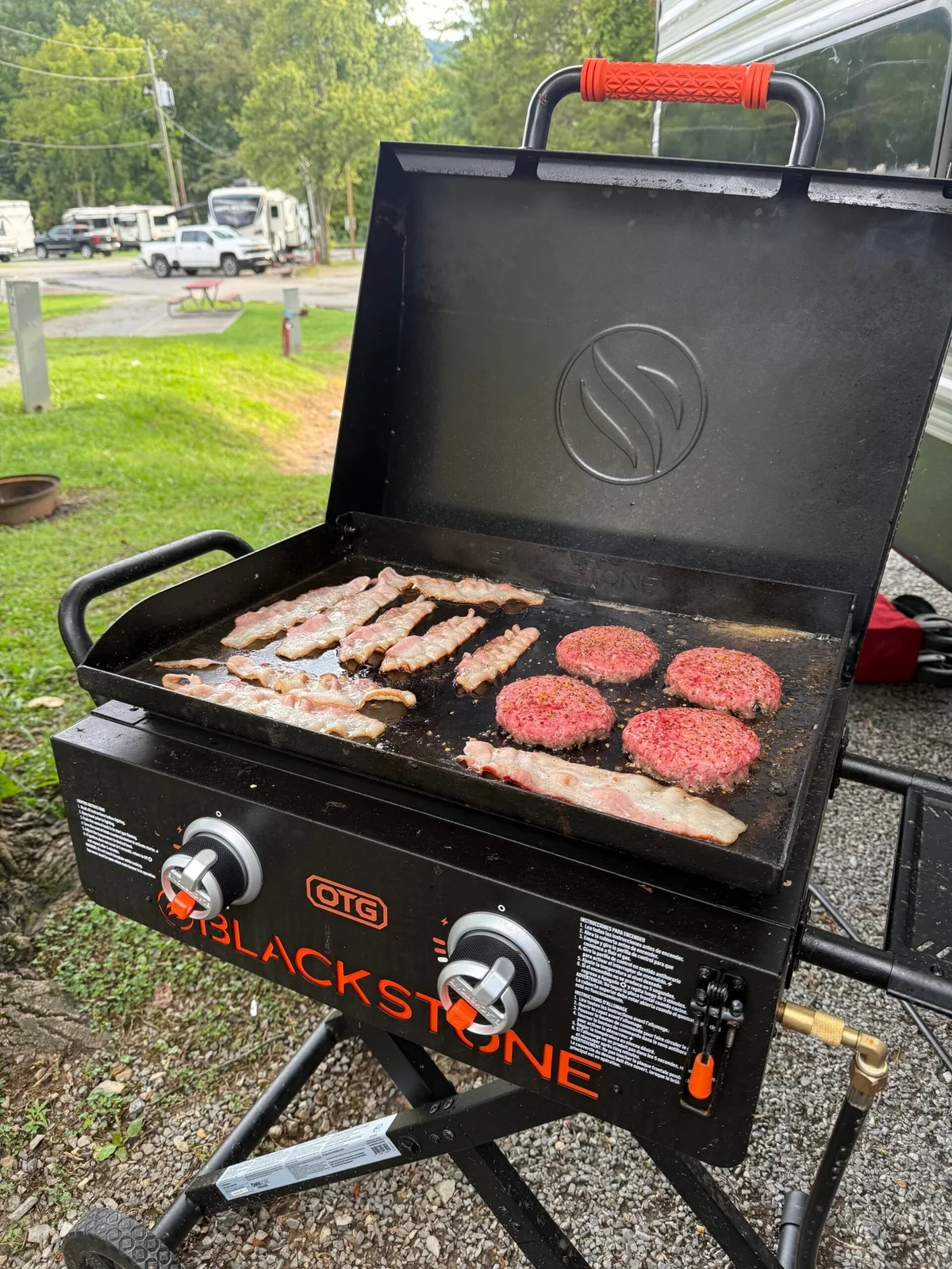 Blackstone griddle in use beside the RV Fam Adventure camper