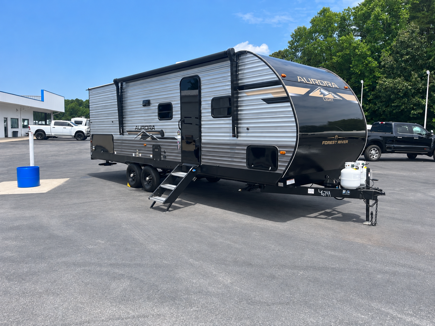 Our Forest River Aurora travel trailer with the entry steps down