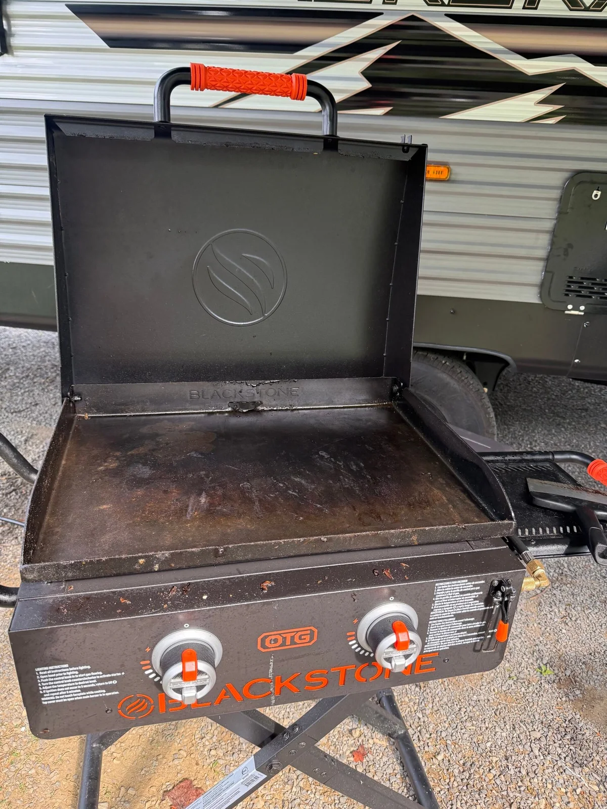 Clean seasoned surface on our Blackstone griddle after campsite cleanup